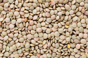Lentils pulse legumes vegetables vegetarian food background.