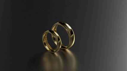The beauty gold wedding rings on black background. 3d rendering