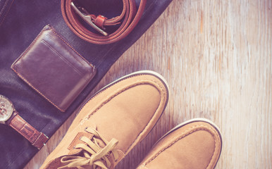 Fototapeta na wymiar Close up vintage leather shoes man accessory. Men's casual outfits with accessories on rustic wood background.