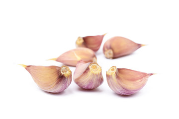 Fresh garlic cloves isolated on white background