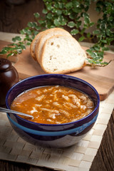 Traditional polish tripe soup with vegetables.