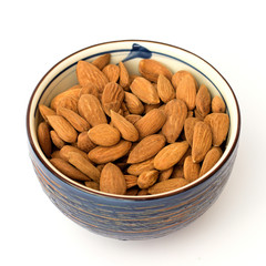 fresh almonds on a white background
