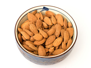 fresh almonds on a white background