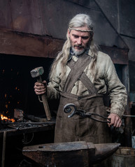 Old blacksmith forges detail in the smithy