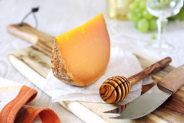 Mimolette cheese and green grapes