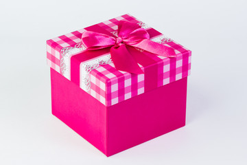 beautiful gift box with a bow on a white background.