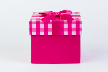 beautiful gift box with a bow on a white background.
