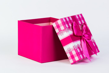 beautiful gift box with a bow on a white background.