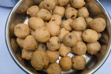 Purnam burelu is a popular south indian sweet made of lentils,jaggery and prepared duing special occasions