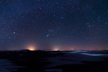 Night landscape with  mountains, sky,  stars