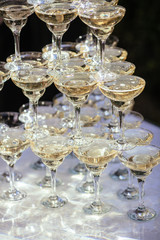 Hill of glasses with a sparkling and white smoke