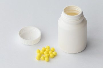 Medicine pills / Little plastic bottle with medicine pills, close-up