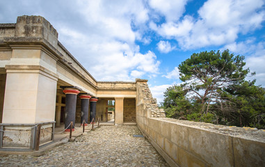 Fototapeta na wymiar Old walls of Knossos near Heraklion. The ruins of the Minoan palaces is the largest archaeological site of all the paleces in Mediterranean island of Crete, UNESCO tentative list, Greece