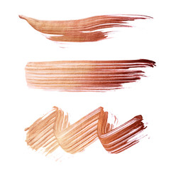 Set of bronze brush strokes of acrilic paint as sample of art product