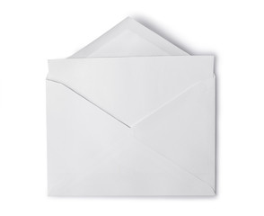 White envelope with folded blank sheet for correspondence