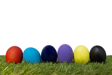 Fototapeta premium Colorful handmade easter eggs on green grass