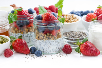 Breakfast in a jar, chia with berries and oat flakes 