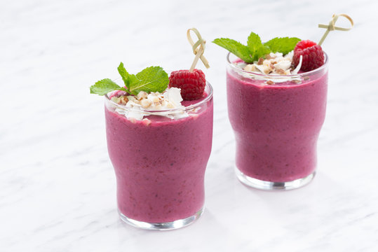berry smoothie in a glass beakers