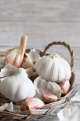 Organic garlic on wooden table