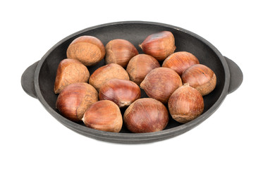 Fresh chestnuts in pan