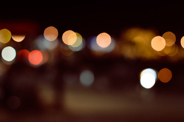 Bright blurry bokeh night city background
