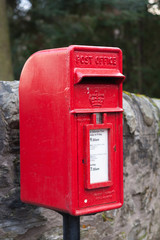 old vintage red postbox in scotland