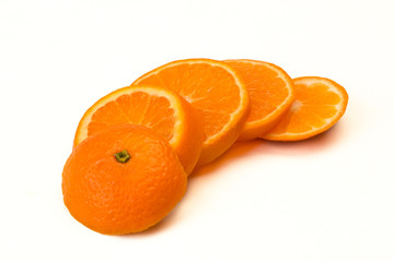 orange cut into slices isolated on white