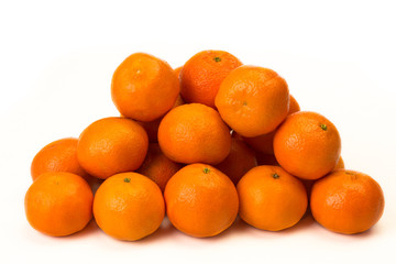 pile of oranges isolated on white