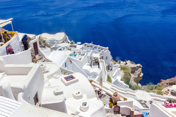 Beautiful View to the sea from Oia village of Santorini island in Greece, typical Greek white architecture