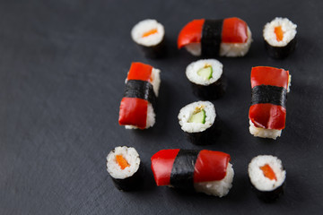 Sushi platter on dark background