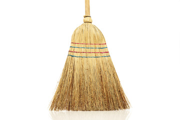 Broom for cleaning on a white background