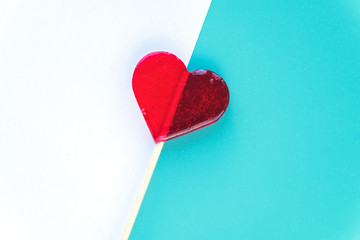 Valentines Day greeting cards with heart lollipop on the background. Shallow Selective focus. Copyspace. Top view. Flat lay.