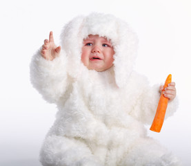 Obraz premium cute baby with rabbit costume