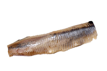 Fillet, back of the herring lies on a white background. Not isol