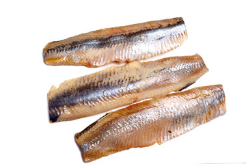 Fillet, back of the herring lies on a white background. Not isol