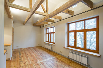 Wooden design. Room studio with a kitchen. Big wooden window.