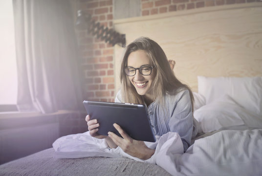 Woman happy with tablet 