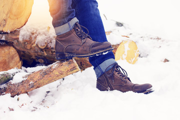 Stylish and fashionable shoes standing on the woods. Early spring, sunny day. Men's fashion.