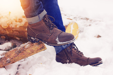 Stylish and fashionable shoes standing on the woods. Early spring, sunny day. Men's fashion.