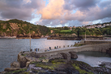 The harbor in Ilfracombe. Fishermen catch fish. Evening. North Devon Coast. UK