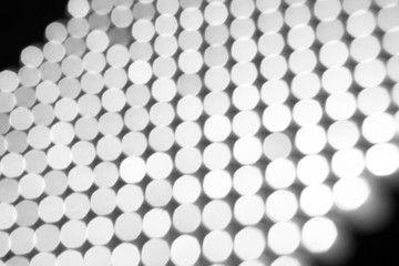 Abstract background, white on black bokeh