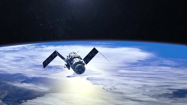 Satellite. The satellite is approaching. Solar panels are revealed. The tracking camera. 4K. 3D Animation.
