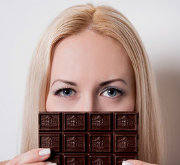 girl hiding behind the chocolate