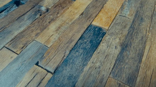 Old wooden plank rotate. Wood texture. Macro shot.