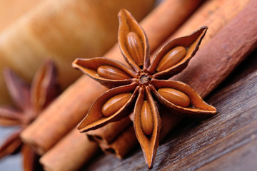 Star anise with cinnamon on table