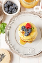 Blueberry pancakes with fresh fruits
