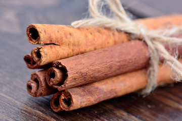 Group of cinnamon sticks on table