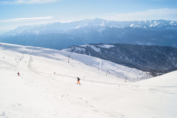 Fototapeta na wymiar People on a ski slope.