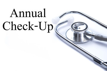 Page with Annual Check-Up on the table with stethoscope, medical