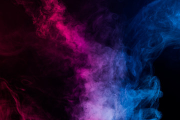 Obraz na płótnie Canvas colorful smoke on black background